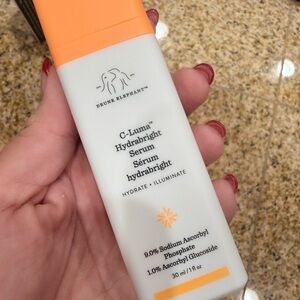 Drunk Elephant C-Luma Hydrabright Serum - Orange and White